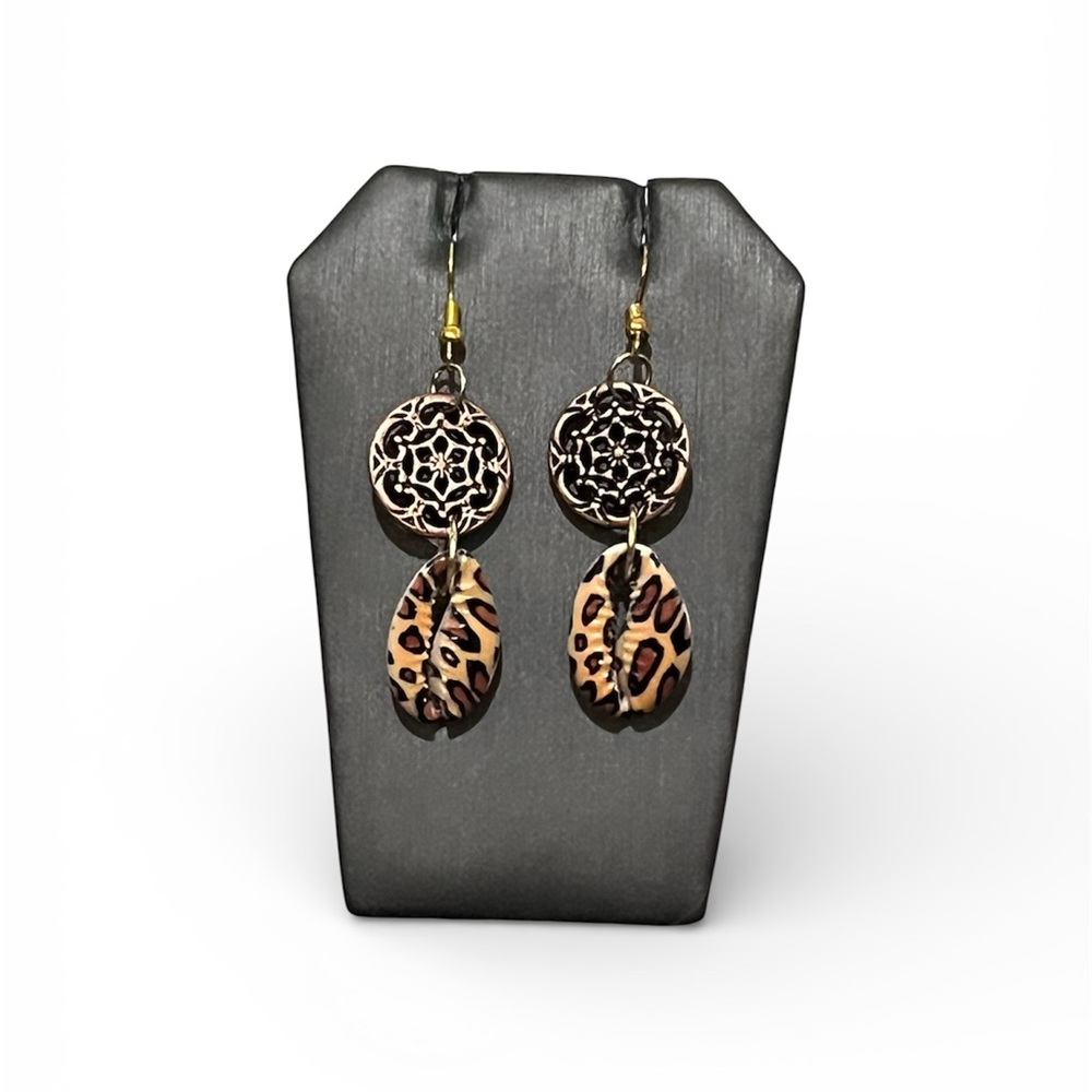 Leopard print shell earrings with black spotted pattern